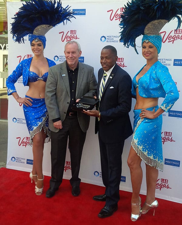 Lawrence Weekly, chairman of the LVCVA Board of Directors (right), presented a key to the Las Vegas Strip to Chris Brown, executive vice president of conventions and business operations of National Association of Broadcasters (left).
